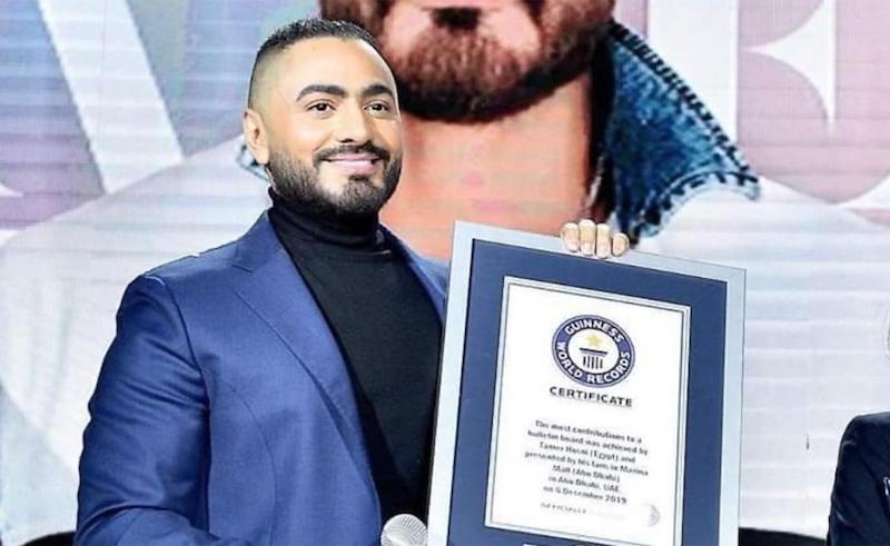 Hosny receiving his official certificate.