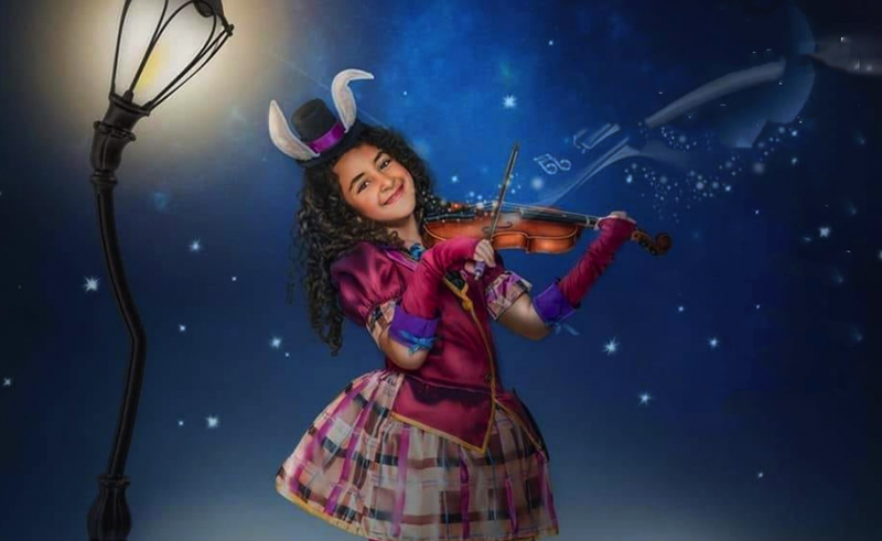 Egyptian Girl Plays Violin in London to Help Fund Mersal Hospital