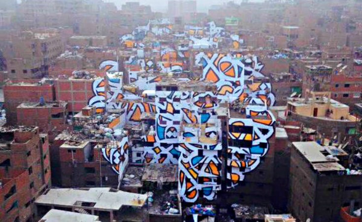 Street Artist El Seed's Calligraffiti Brings Out The Beauty of Manshiyat Naser