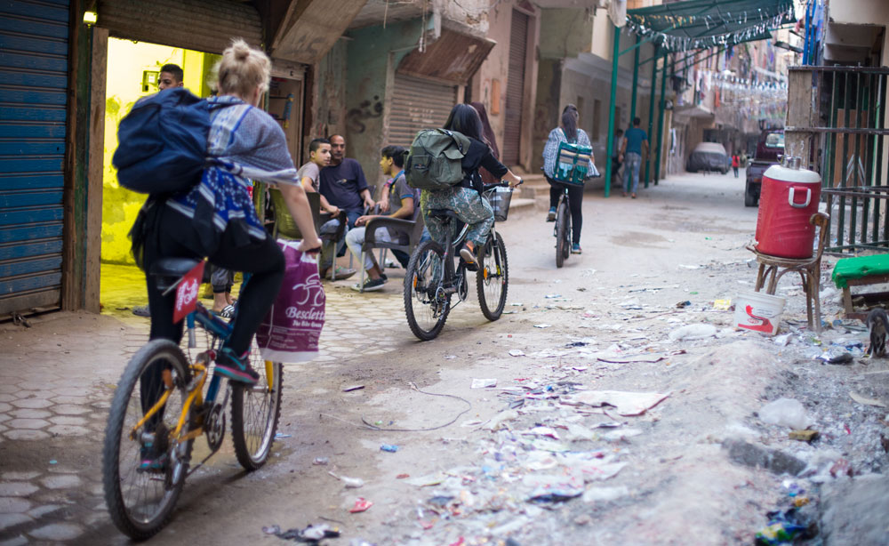 Meet the Egyptian Girl Feeding the Poor 'Bel Bicycle'