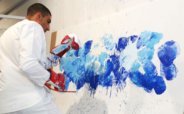 Egyptian Boxer Becomes a Worldwide Sensation Making Art by Punching Walls